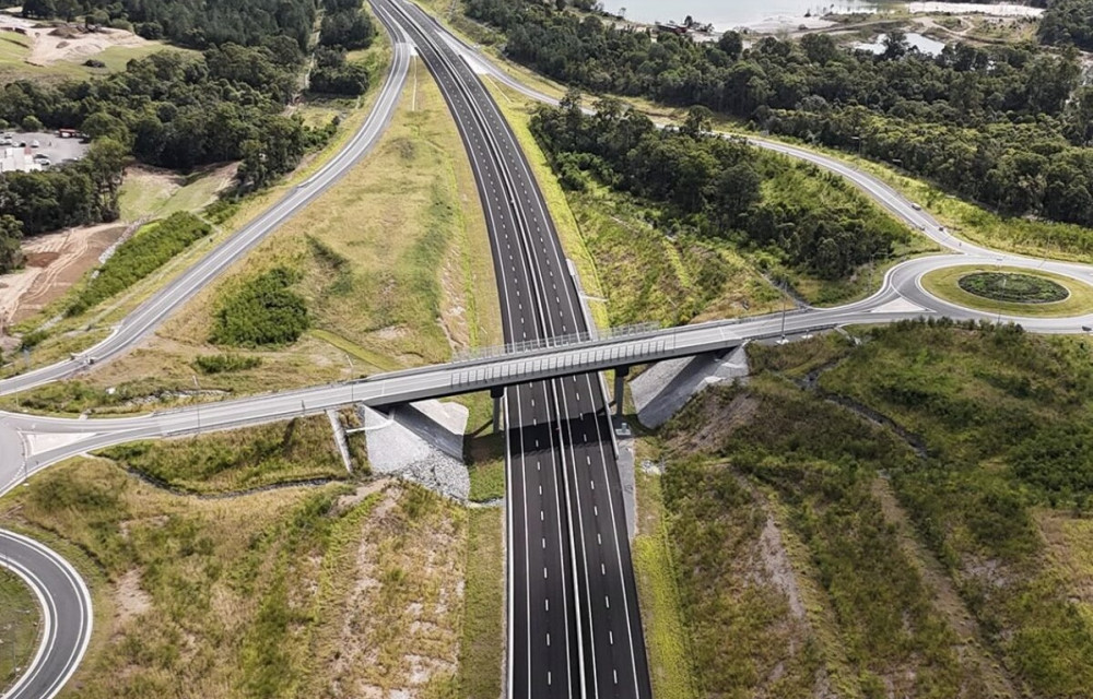 Artist impression of a regional highway upgrade showing new roadworks and drainage improvements in Far North Queensland