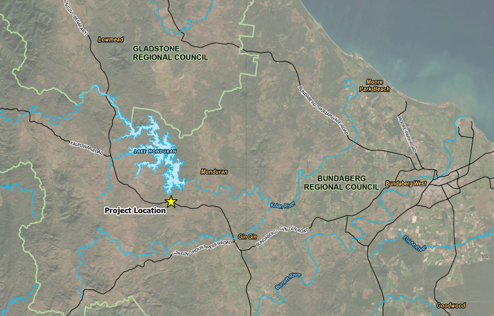 Aerial view of the proposed 13.3-hectare Monduran Battery Storage System site south of the Bruce Highway near Gin Gin, showing planned battery enclosures and underground cable route to Powerlink’s existing substation.
